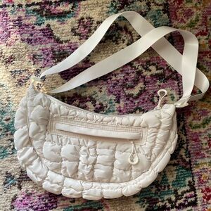 Crescent shape handbag